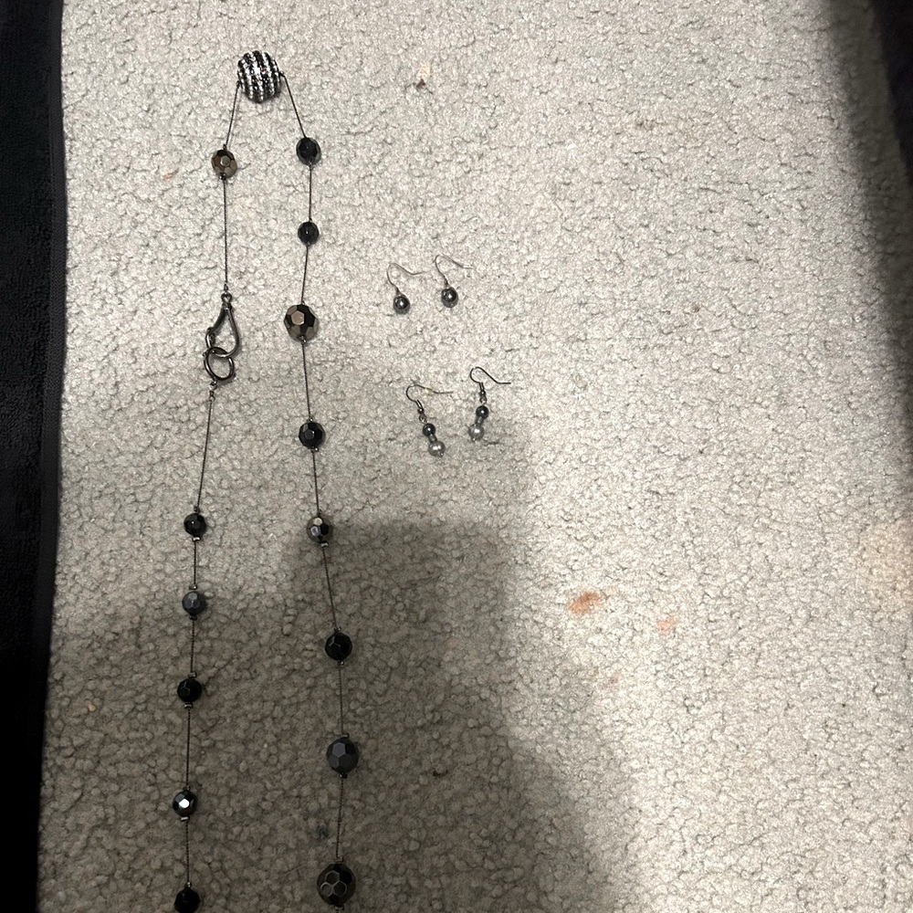Black drop earrings with long black necklace